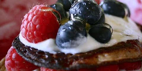 banana pancakes with berries and yoghurt